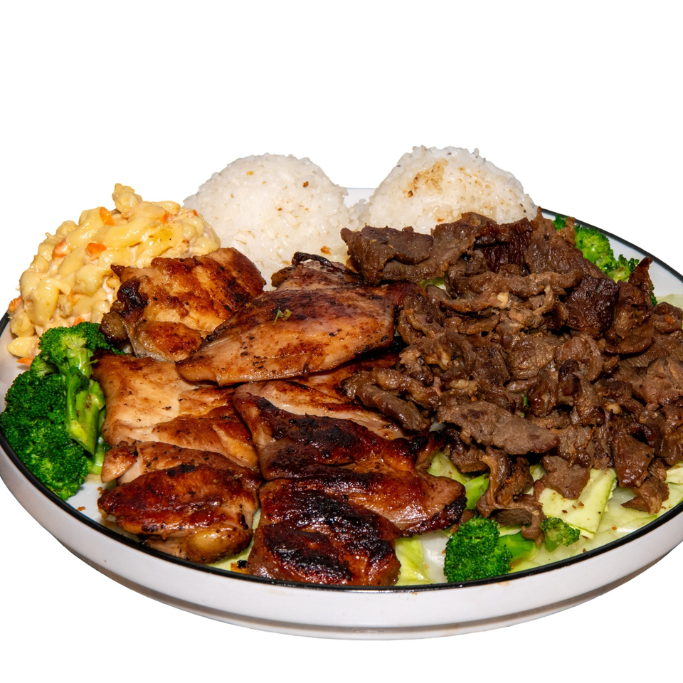 A large plate of grilled chicken, beef, macaroni salad, rice, and broccoli.