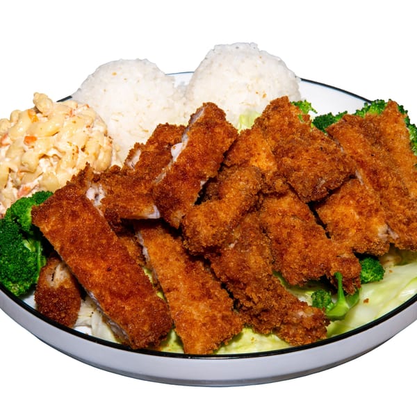 A plate of crispy fried chicken cutlets, two scoops of white rice, macaroni salad, and broccoli.